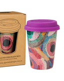Colorful insulated mug with purple lid next to its packaging box on a white background