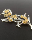 Wattle enamelled brooch